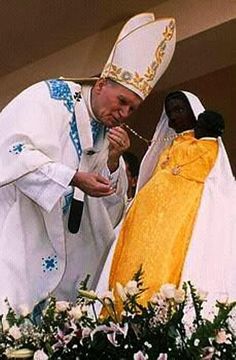 black madonna pope john paul kissing
